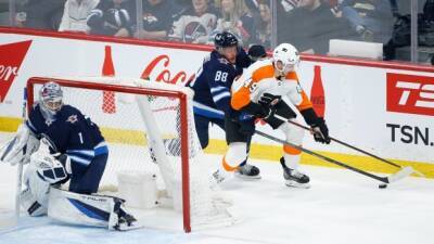 Comrie gets first shutout as Jets beat Flyers
