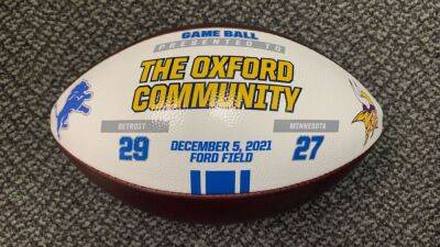 Detroit Lions deliver winning game ball dedicated to town following Oxford High School shooting