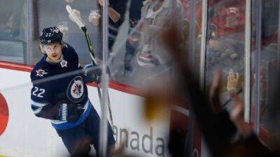 Jets down playoff-bound Flames in penultimate game