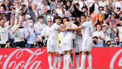 Real Madrid hammer Espanyol to seal La Liga title