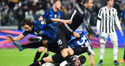 Soccer-Champions Inter earn crucial win at Juventus with controversial penalty