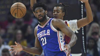 Joel Embiid scores 44 as Sixers beat Cavs to clinch playoff spot