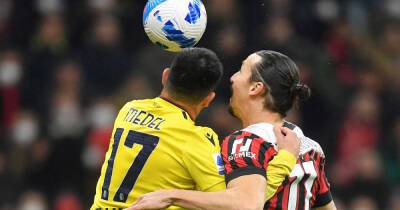 Soccer-Milan held by Bologna, lead now one point atop Serie A