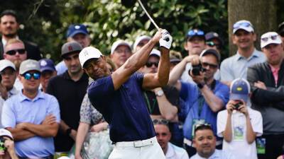 Tiger Woods' Masters practice round draws massive crowds