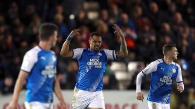 Jonson Clarke-Harris earns struggling Peterborough a point