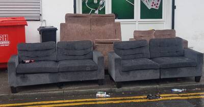 Shop owner dumped four SOFAS at the back of his business