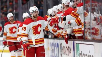 Flames capitalize on momentum of quick start to topple lowly Ducks