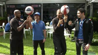 Fernando Alonso & Esteban Ocon show off basketball skills alongside Harlem Globetrotters