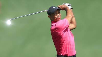 Tiger Woods hits 71 in Masters comeback to sit three shots behind first-round leader Cameron Smith