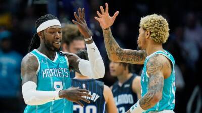 Ball leads Hornets past Magic after three players ejected