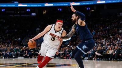 NBA roundup: Nuggets seal playoff bid as Nikola Jokic makes history