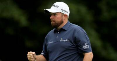 Masters: Lowry benefits from blustery conditions as Woods fights to make cut