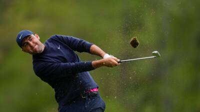 Scottie Scheffler proves top ranking as Tiger Woods fights back in Masters