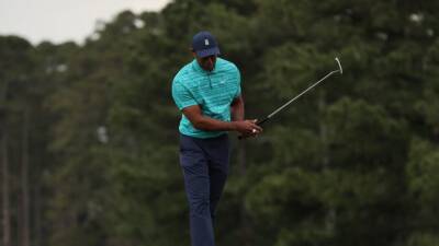 Golf - Woods 'proud' of himself after battling to equal 19th at Masters