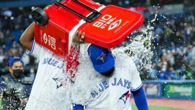 16 Jays players and coaches describe atmosphere, emotion of opening day
