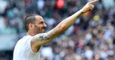 Soccer-Bonucci double earns Juve win over Venezia to all-but secure fourth spot