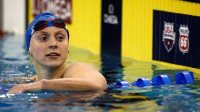 Katie Ledecky wins by 12 seconds in trials finale, can tie Michael Phelps record at worlds