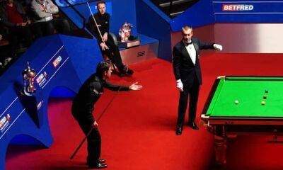Ronnie O’Sullivan rows with referee as Judd Trump makes up ground in final
