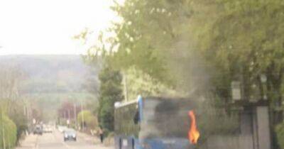 "It was surreal - as we got off we could see the flames under the bonnet": dramatic photos capture bus fire