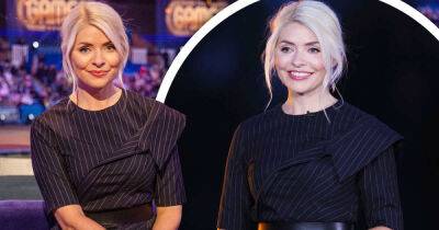 Holly Willoughby makes a stylish statement in an asymmetric draped top