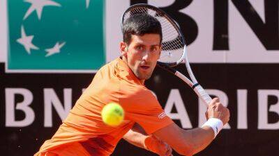 Aslan Karatsev - Novak Djokovic wins opener at Italian Open with vintage scrambling - espn.com - France - Italy - Australia -  Rome