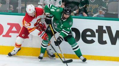 Stars F Benn fined $5K for tripping Flames' Lewis