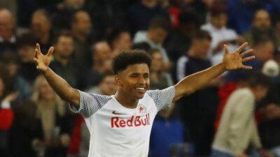 Dortmund sign Austrian league top scorer Adeyemi as Haaland replacement
