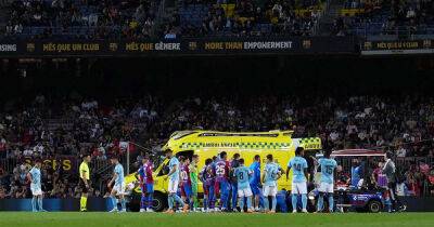 Barcelona's Araujo stretchered onto ambulance at Camp Nou after collision with Gavi