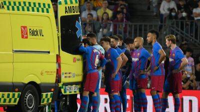 Barcelona defender Ronald Araujo taken to hospital and conscious after sickening clash of heads