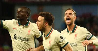Liverpool edge past Villa to keep title hopes alive