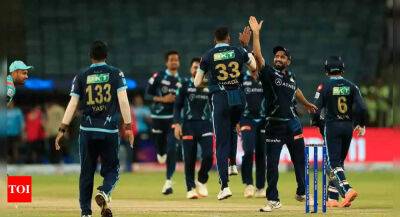 Brian Lara - Rahul Tewatia - IPL 2022, GT vs LSG: Gujarat Titans lord over Lucknow Super Giants, become first team to enter playoffs - timesofindia.indiatimes.com - Afghanistan -  Pune -  Hyderabad