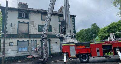 Firefighters battle blaze at derelict former pub - manchestereveningnews.co.uk - Manchester