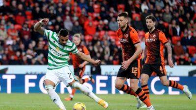 Celtic clinch league title with 1-1 draw at Dundee