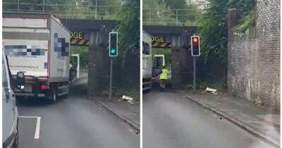 Lorry driver in bizarre stand-off with bridge after being spurred on by fellow motorists - manchestereveningnews.co.uk - Manchester