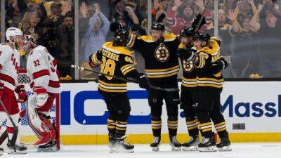 Bruins rout Hurricanes to force Game 7
