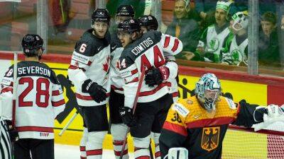 Tim Stutzle - Red Wings - Adam Lowry - Canada gives up two 5-on-3 goals in third, hang on for win over Germany - tsn.ca - Germany - Canada -  Anderson -  Detroit - county Kent - county Logan - county Johnson -  Ottawa - county Morgan -  Helsinki