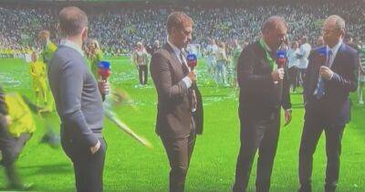 James Macfadden - David Turnbull - Celtic fan wiped out by steward as pitch invader gatecrashes Ange Postecoglou interview live on air - dailyrecord.co.uk - Scotland