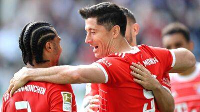 Robert Lewandowski hits 50-goal mark as Bayern Munich sign off season with draw at Wolfsburg
