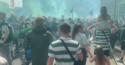 Celtic fans turn Glasgow green and white as thousands descend on city centre for jubilant pyro party