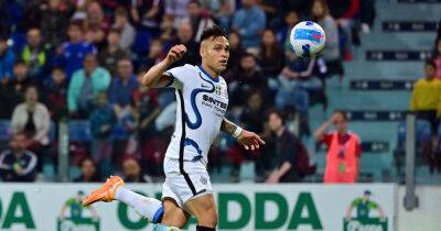 Soccer-Inter take Serie A title race to final day with victory at Cagliari