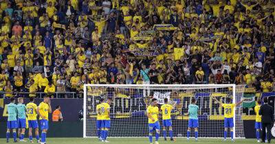 Soccer-Alaves relegated, Cadiz earn lifeline by drawing with Real Madrid