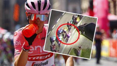 Giro d'Italia 2022 - Watch shocking moment race leader Juan Pedro Lopez throws bottle at rival Sam Oomen