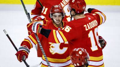 Johnny Gaudreau's OT winner lifts Flames to victory over Stars, Battle of Alberta is next