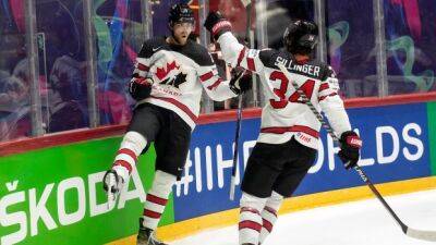 Adam Lowry - Dubois strikes twice again, Canada remains perfect at worlds with win over Slovakia - tsn.ca - Canada - Beijing - Kazakhstan - county Canadian - Slovakia - county Cole -  Helsinki