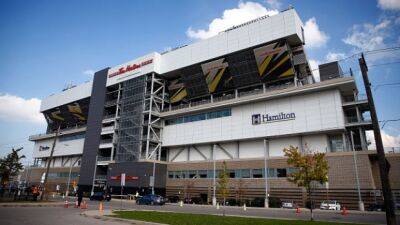 CFL strike blog: Ticats players gather outside Tim Hortons Field