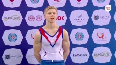 Ivan Kuliak - Russian gymnast Ivan Kuliak banned for one year after wearing pro-war symbol on podium - edition.cnn.com - Russia - Qatar - Ukraine - Belarus