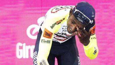 Prosecco corks axed from podium celebrations after Biniam Girmay’s freak eye injury at Giro d’Italia