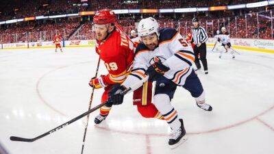 Connor Macdavid - Leon Draisaitl - Matthew Tkachuk - Mikko Koskinen - Andrew Mangiapane - Mike Smith - Flames outfire Oilers in explosive series opener as rivals combine for 15 goals - cbc.ca