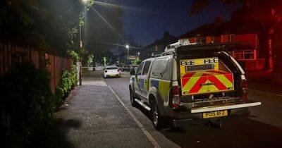 Two men from Rochdale charged after van driven at police officer