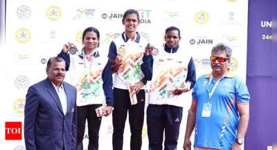 KIUG: Priya Mohan beats Dutee Chand to win 200m gold, Jain University still on top of table - timesofindia.indiatimes.com - India